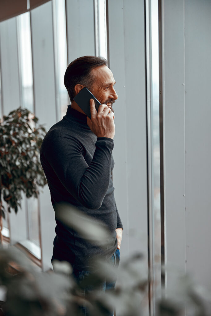 Talking on the phone in the office